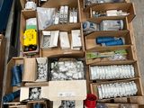 many boxes of assorted items sitting on the floor