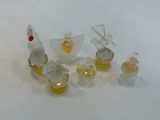 a lot of small glass objects that are on the table
