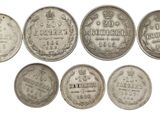 un lot de six pièces d'argent portant les noms de différents pays