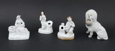 five figurines of animals that are sitting on a table