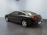 an image of a black car in a room