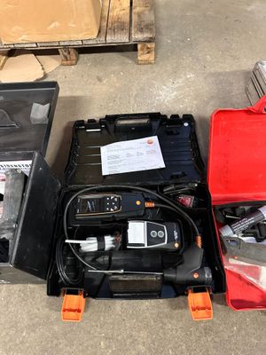 many different types of tools sitting on the floor