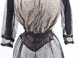 an image of a black and white dress on a mannequin mannequin