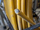 a close up view of a bunch of yellow hoses