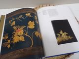 an open book with a picture of a bird on it