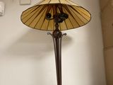 a lamp that is sitting on top of a microwave