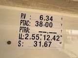 a sign on the side of a building that says pv ptac