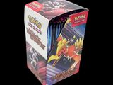 the box contains a variety of pokemon cards on display