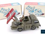 a toy army truck with a flag on top of it