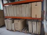 many boxes on a pallet in a warehouse