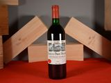 a bottle of wine that is sitting on a table