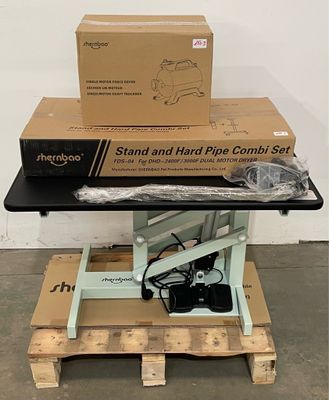 a table that has a box on top of it and a box on top of it