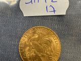 a close up of a gold coin with a price tag on it