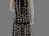 an image of a mannequin dressed in a polka dot print dress