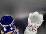 three vases are sitting next to each other on a table