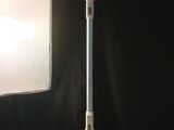 a light that is on a table next to a monitor