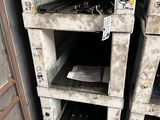 many stacks of ovens that are stacked on top of each other
