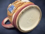 a close up of a coffee cup on a table