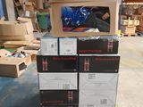 many boxes stacked on top of each other in a warehouse