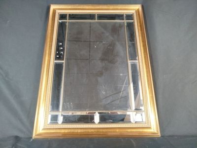 a mirror that is sitting on a table