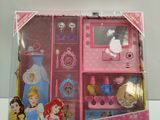 a pink box with a set of princess toys inside of it