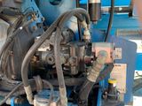 a close up of a truck engine with a cow horn on it ' s back