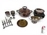 an image of a collection of antique silverware including a teapot, teapot, spoons, and a teapot
