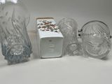 a lot of glass items that are sitting on a table