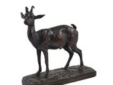 bronze statue of a deer on a base with a white background