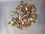 a pile of assorted metal items on a table