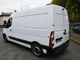 a white van that is parked in a parking lot