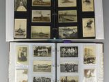 an old photo album with a lot of pictures on it