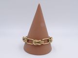 a close up of a ring on a cone on a white background