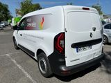 a white van that is parked in a parking lot