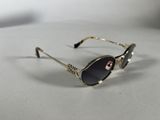 a close up of a pair of sunglasses on a table