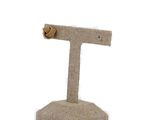 the earring stand is made of burlock and has a knot on it