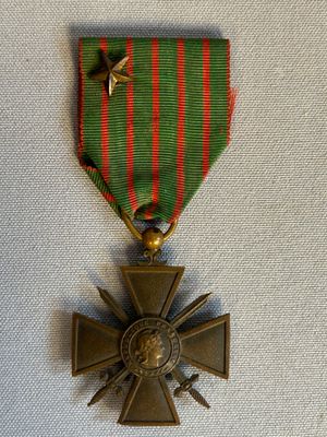 l'image d'une médaille portant une étoile