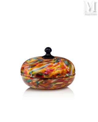 an image of a colorful glass bowl with a black lid