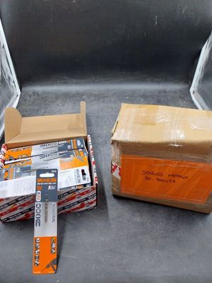 a box of batteries and a box of batteries on the ground