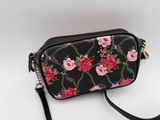 black floral print cross body bag with chain strap