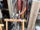 a picture of a room with a lot of clutter and tools