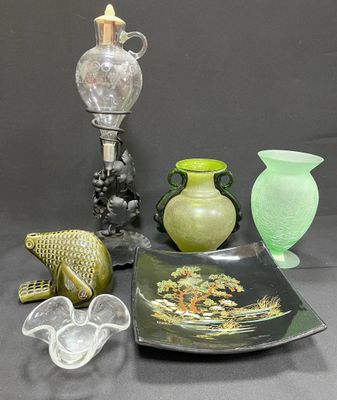 a lot of glass items that are on a table