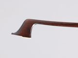 a close up of a pair of glasses with a wooden handle