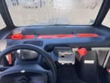 a view of the inside of a vehicle from the driver ' s seat