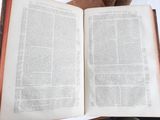 an open book that is sitting on a table