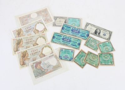 many different types of paper money on the table