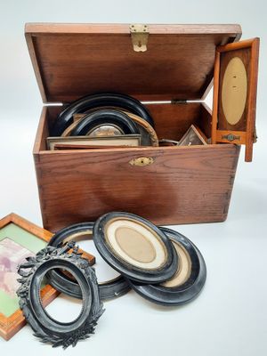 a wooden box with a picture inside of it