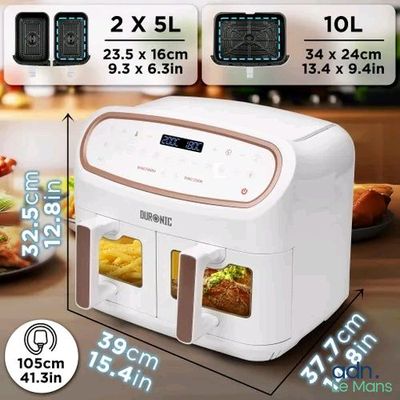 an image of a white air fryer sitting on top of a wooden table