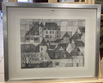 drawing of a village in a frame on a shelf in a room