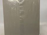 the back of a silver box with a white label on it